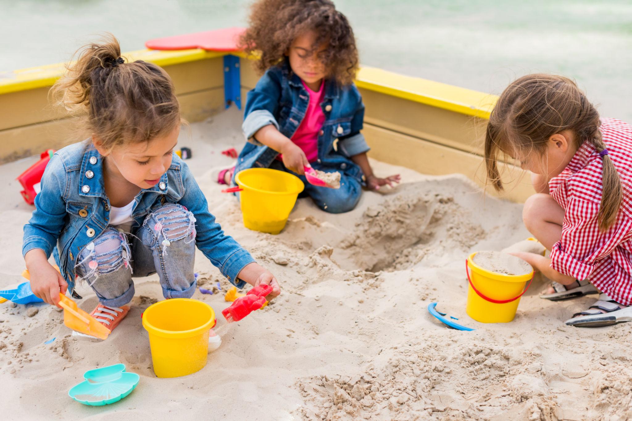 Outdoor sandbox play — summer camp fun at Lollipop Patch